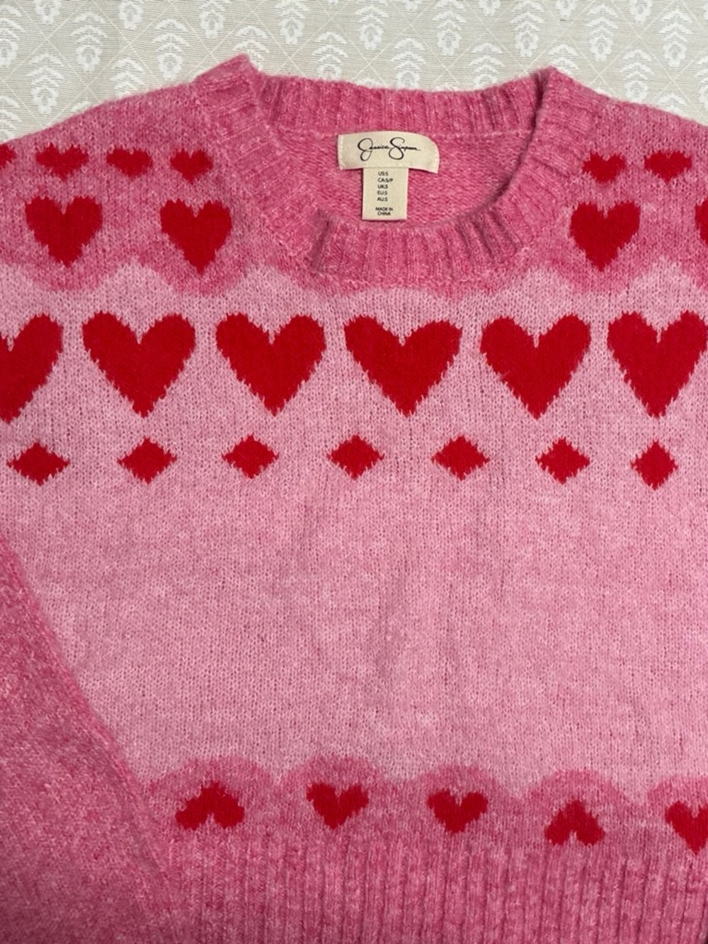 Jessica Simpson Pink Sweater with Red Heart Pattern